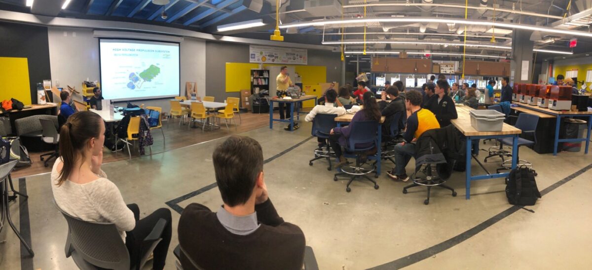 Audience for Chevy demonstration in the Flowers Invention Studio