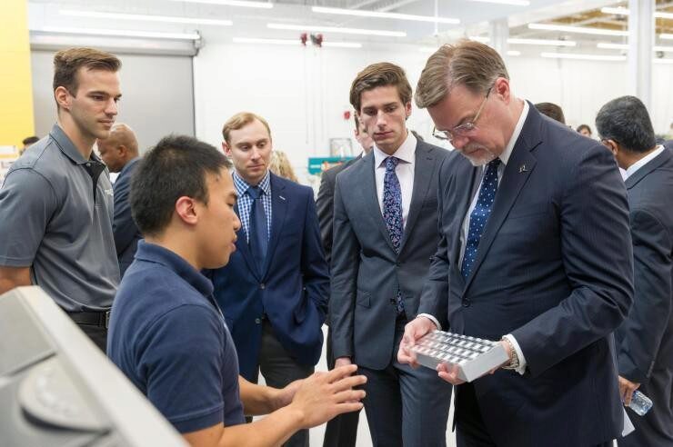 Toni Cvitanic (left) and Vinh Nguyen (right) at Georgia Tech with Boeing executives (far right)